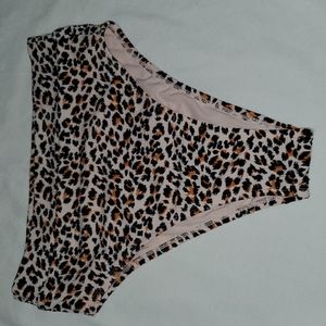 Leopard print,  ribbed high waist,  high leg. Cheeky bottom